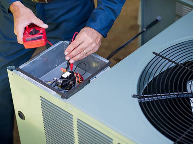Working on an HVAC system 